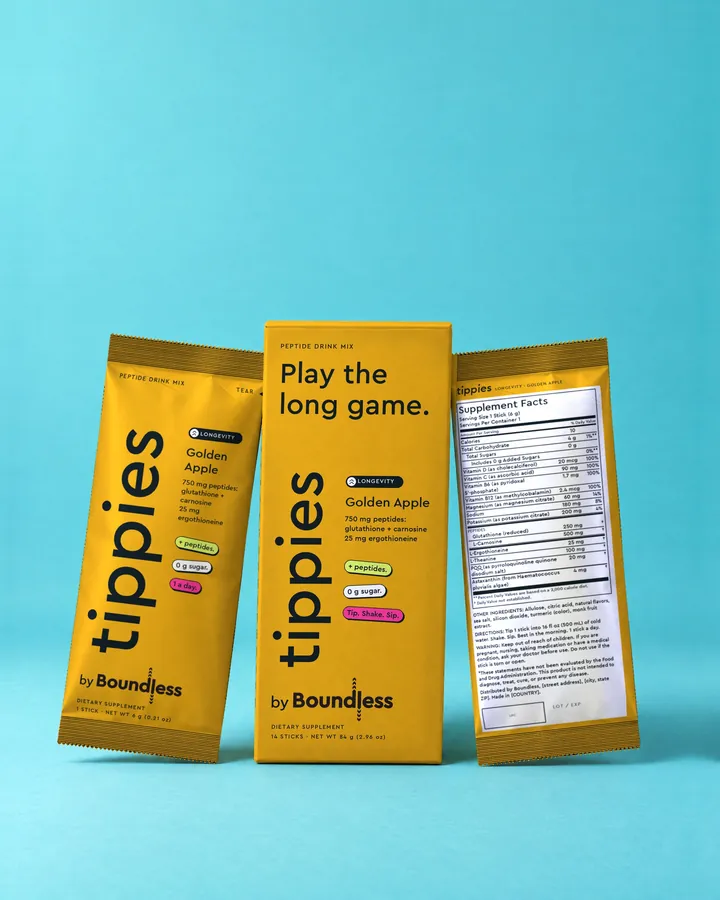 tippies Longevity golden apple peptide drink mix, box and sticks on a turquoise background